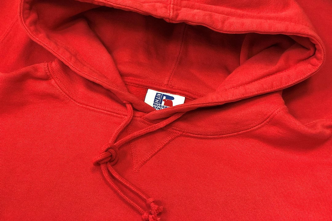 Closeup picture of Russell Athletic hoodie showing the v-notch design.